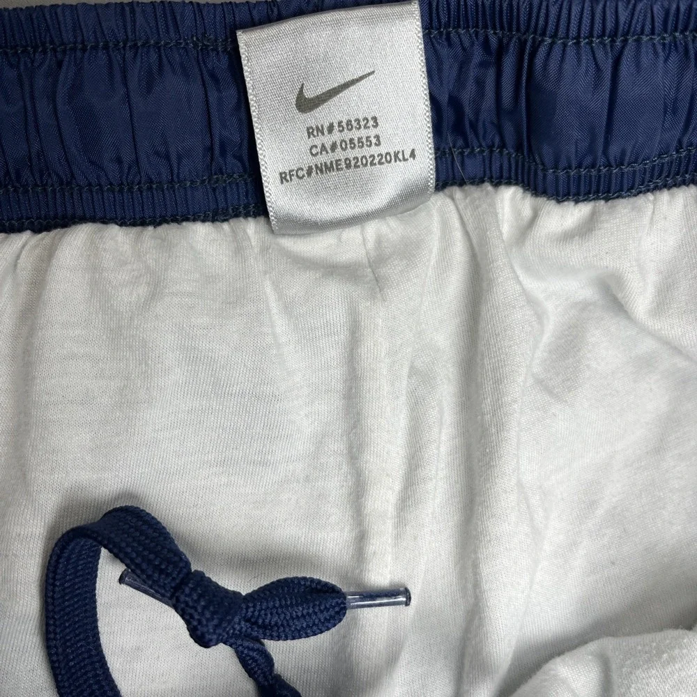 Vintage Nike Youth M (8-10) Blue Nylon Track Pants Zip Ankle Cinch Waist Retro